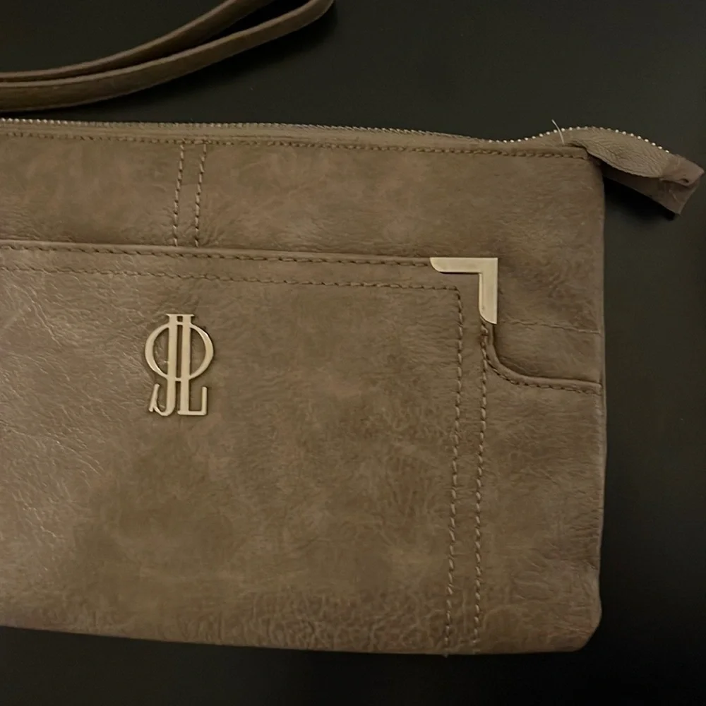 Jennifer Lopez sleek wristlet
